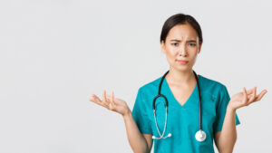 asian urgent care worker asked questions