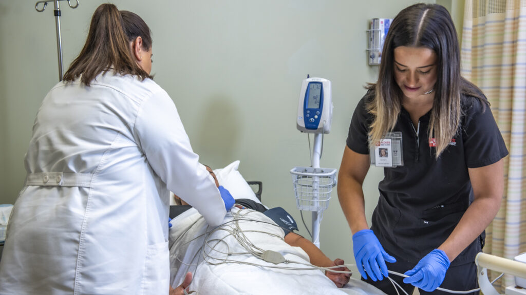 Access Total Care staff offering immedaite care to patient at their urgent care facility