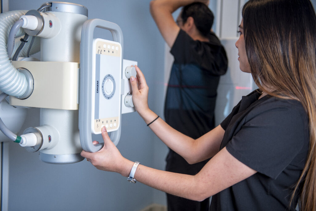 woman providing xrays for patient urgent care