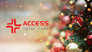 closeup of christmas tree during holidays with access total care logo