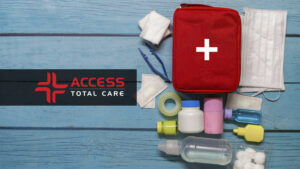 picture of open first aid bag with items on wooden table, top view, first aid tips